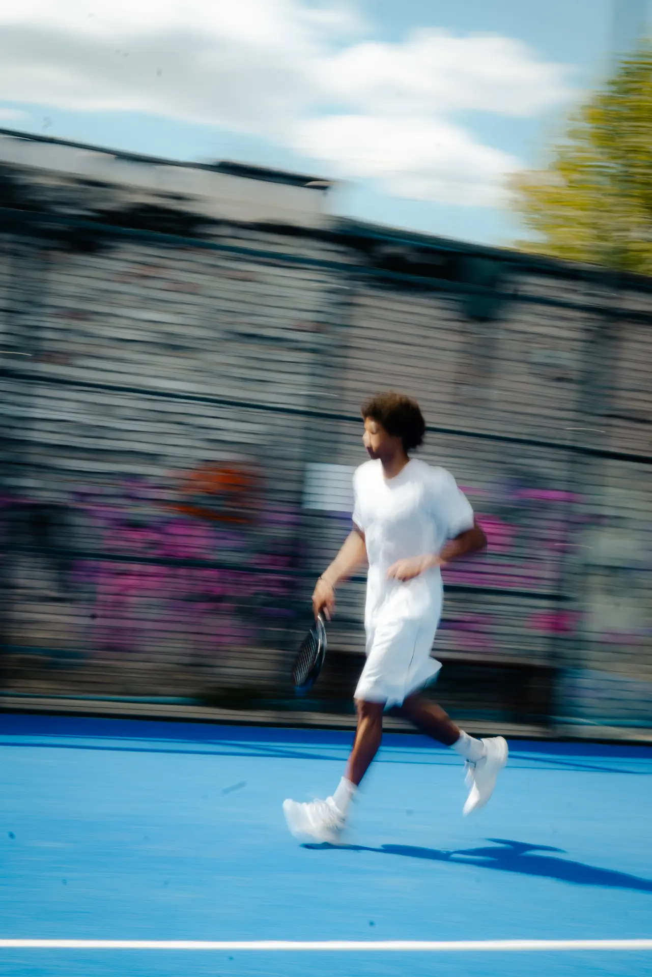 Player in motion on the blue court